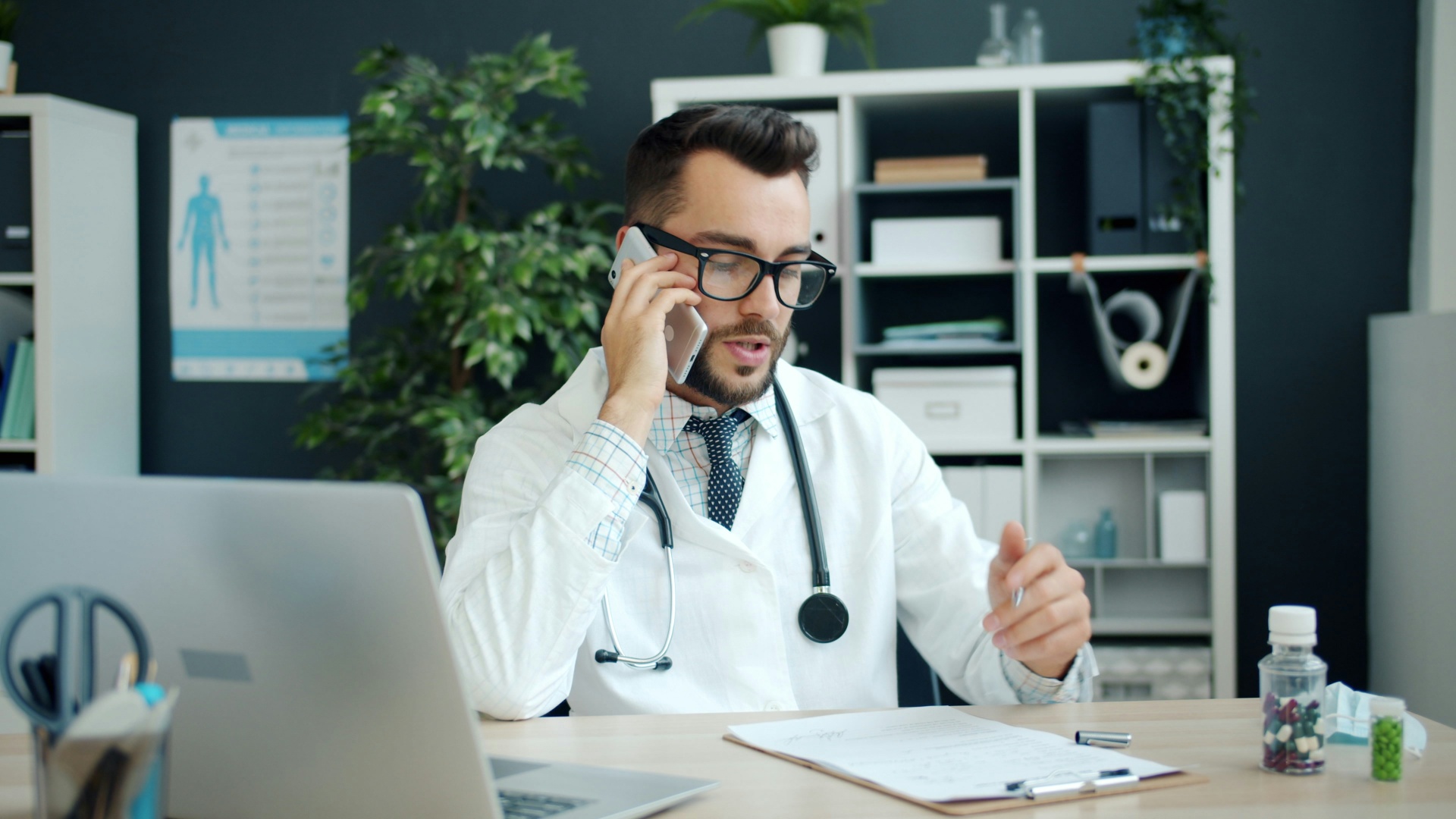 Montana physician taking a patient call from a clinic office